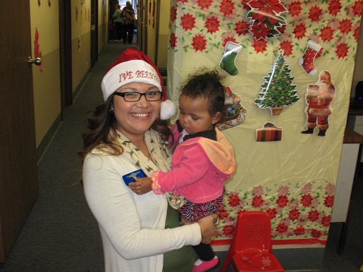 Antonia holding a baby